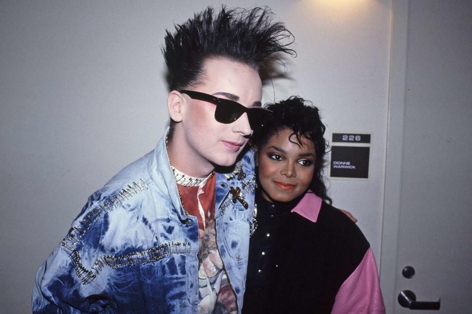 <p>Andre Csillag/Shutterstock</p> Boy George and Janet Jackson in Los Angeles in March 1986