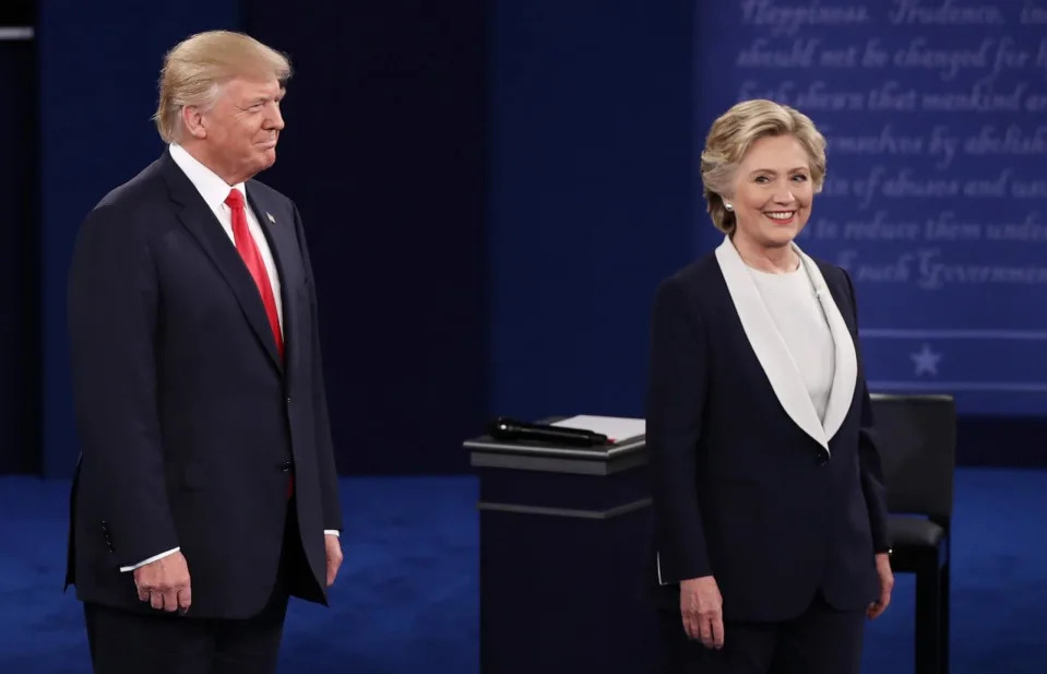 PHOTO: Formers Republican presidential nominee Donald Trump (L) and Democratic presidential nominee former Secretary of State Hillary Clinton stand on stage during the town hall debate at Washington University on Oct. 9, 2016 in St Louis, Mo. (Win Mcnamee/Getty Images, FILE)