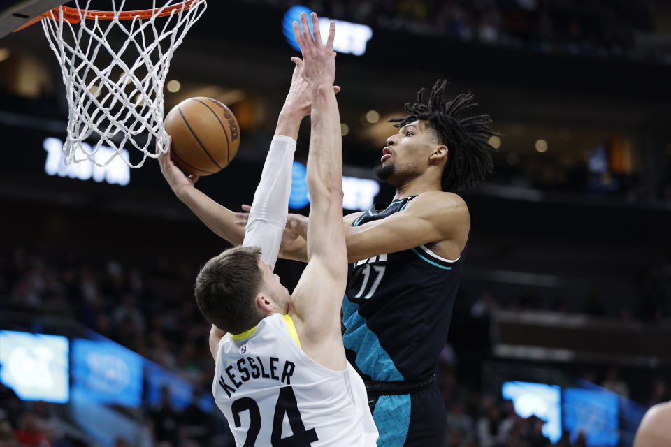 Portland Trail Blazers guard Shaedon Sharpe (17) shoots against Utah Jazz center Walker Kessler (24) in the first half during an NBA basketball game, Wednesday, March 22, 2023, in Salt Lake City. (AP Photo/Jeff Swinger)