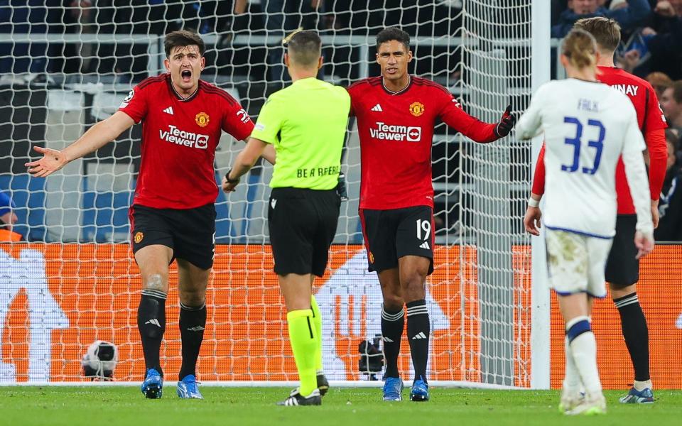 Harry Maguire (left) - Harry Maguire: Premier League must take lead and change rules over ‘soft’ penalty decisions