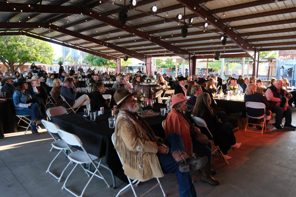 Attendees enjoy the concert Sunday evening at the Rangeland Fire Relief Benefit Concert at the Starlight Ranch in Amarillo.