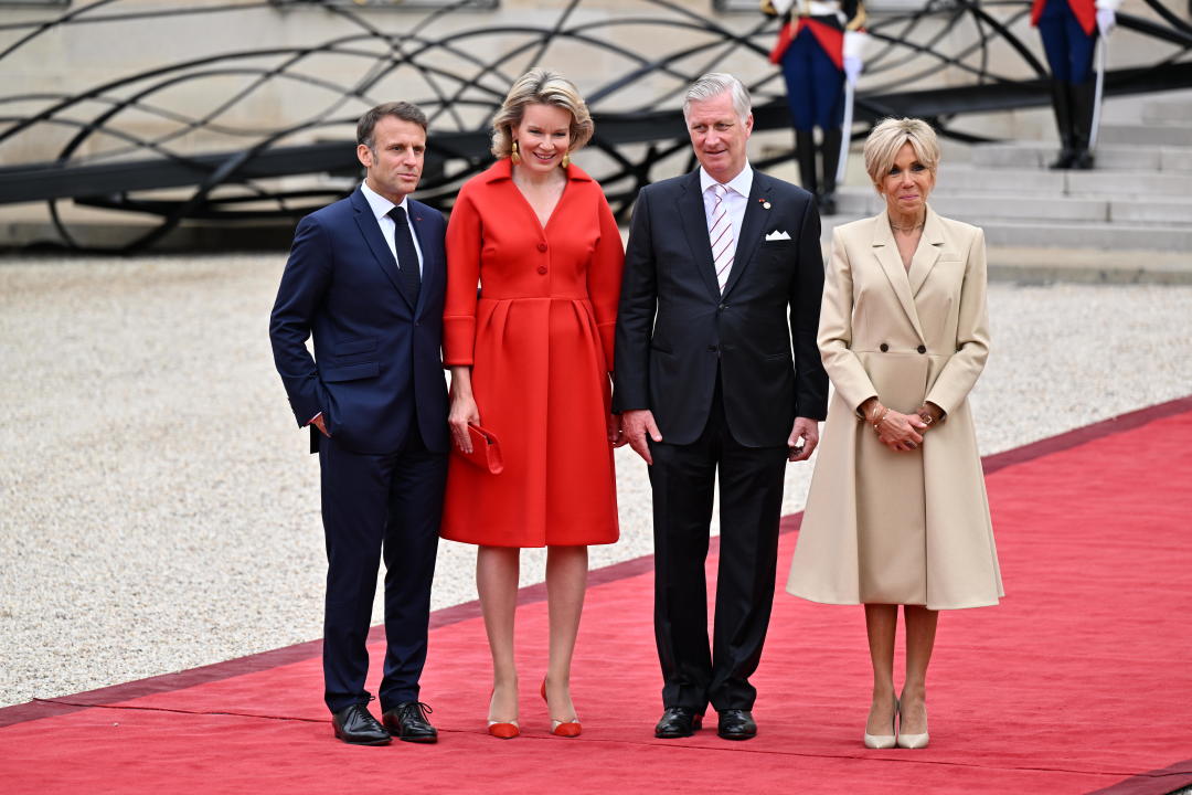 PARIS, FRANCE - JULY 26: France's President Emmanuel Macron and his wife Brigitte Macron greet King Philippe of Belgium and Queen Mathilde of Belgium on arrival ahead of a reception for heads of state and governments ahead of the opening ceremony of the Paris 2024 Olympic Games, at the Elysee presidential palace in Paris, on July 26, 2024. (Photo by Mustafa Yalcin/Anadolu via Getty Images)