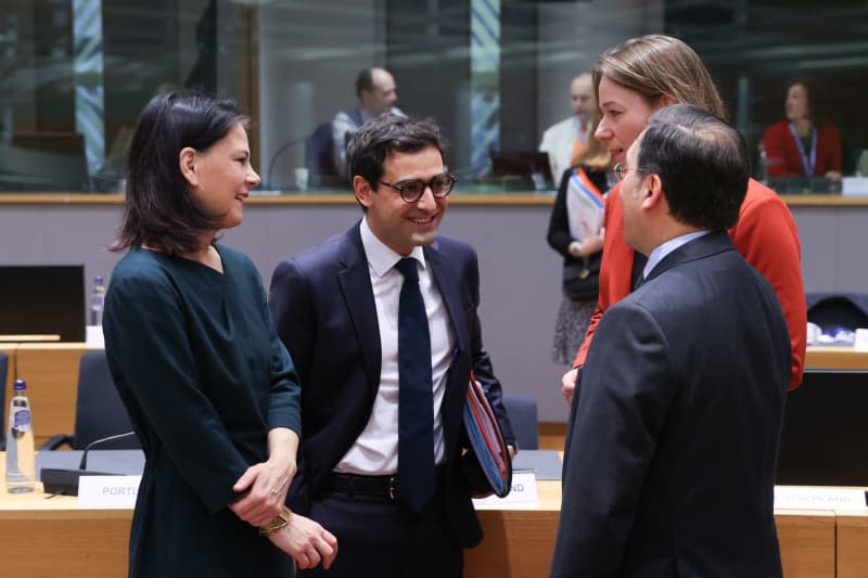 German Foreign Minister Annalena Baerbock (L) and French Foreign Minister Stephane Sejourne (2nd L) attend the EU Foreign Affairs Council meeting. Francois Lenoir/European Council/dpa