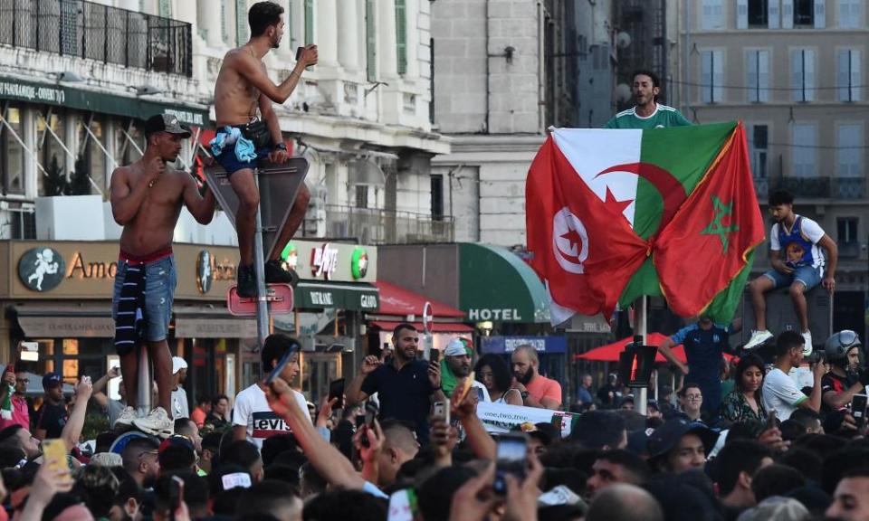 Algerian supporters celebrate in Marseille after their team’s victory.