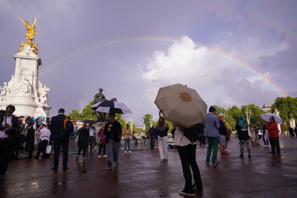 A rainbow appeared outside Buckingham Palace (PA)