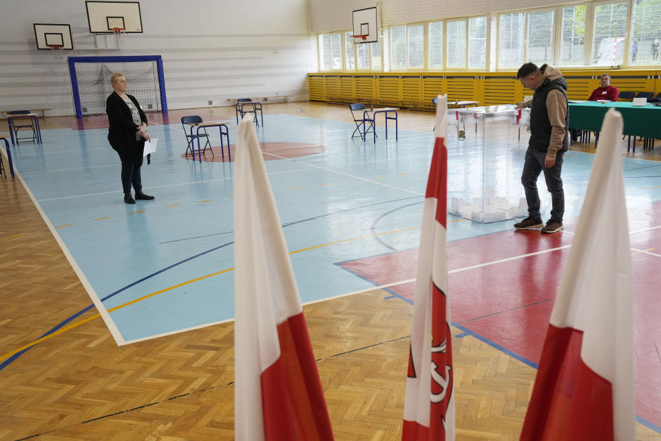 Polish voters take part in a local runoff election in Lomianki, near Warsaw, Poland on Sunday, April 21, 2024. Voters are choosing mayors who did not win outright in the first round of the election two weeks earlier. (AP Photo/Czarek Sokolowski)