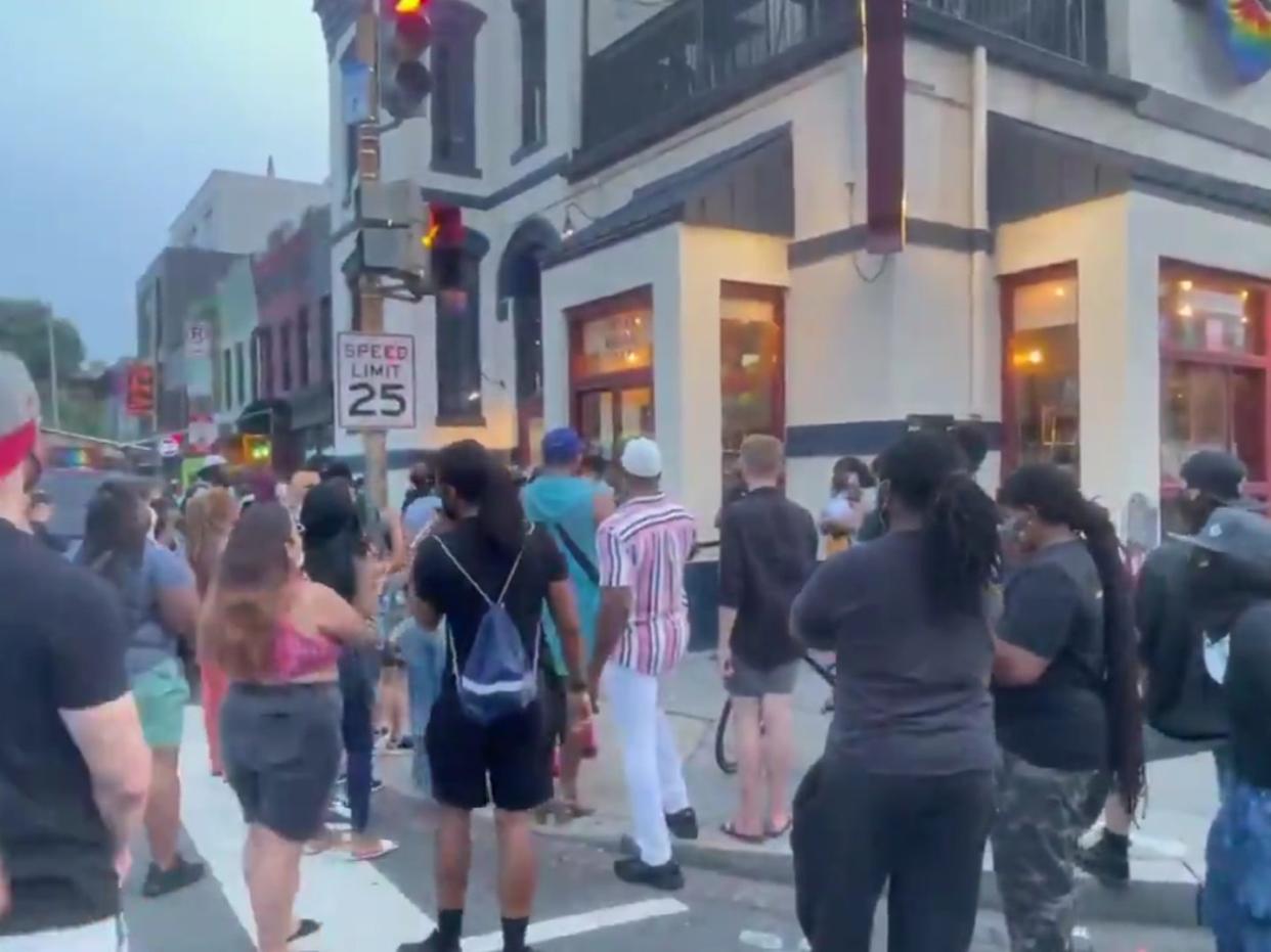 Anti-racism protesters outside a spots bar in Washington DC on Sunday (ChuckModi/Twitter)