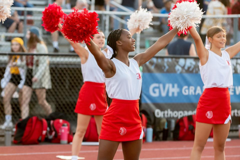 Souderton cheerleaders rally from the sidelines during a football game against Pennridge at Souderton Area High School in Franconia Township on Friday, September 2, 2022. Big Red defeated the Rams 24-21.