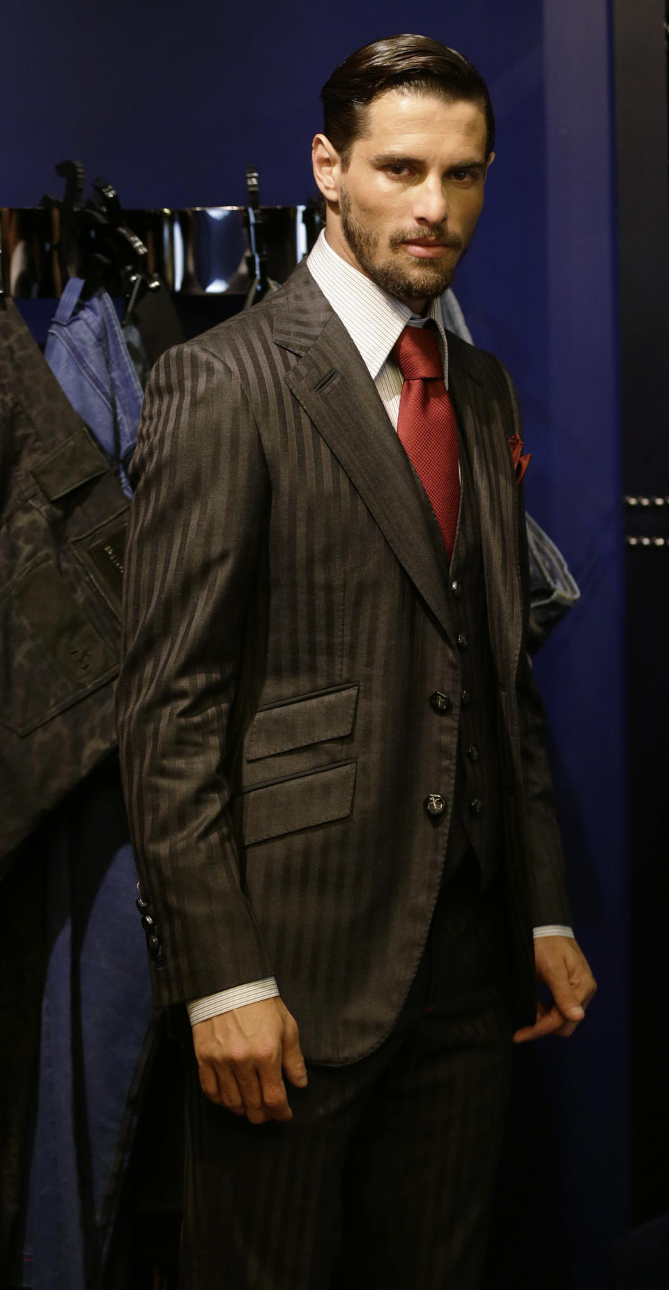 A model wears a creation for Angelo Galasso men's Fall-Winter 2013-14 collection, part of the Milan Fashion Week, unveiled in Milan, Italy, Sunday, Jan. 13, 2013. (AP Photo/Luca Bruno)