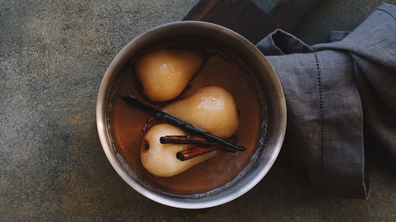 Poached pears in pot 