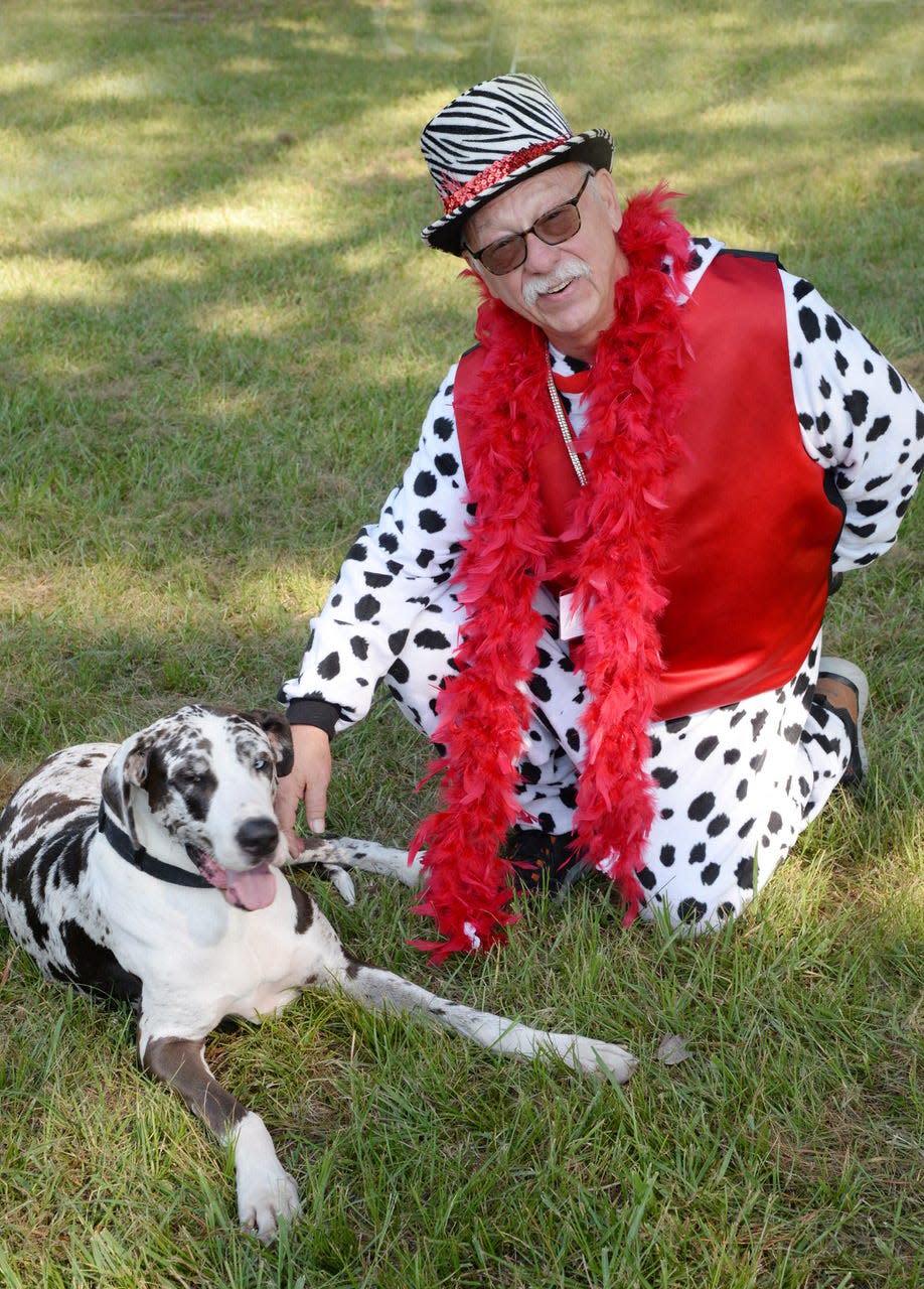 WellsFest Pet Parade chairman Bob Kersh poses with his dog Sasha at a past WellsFest.