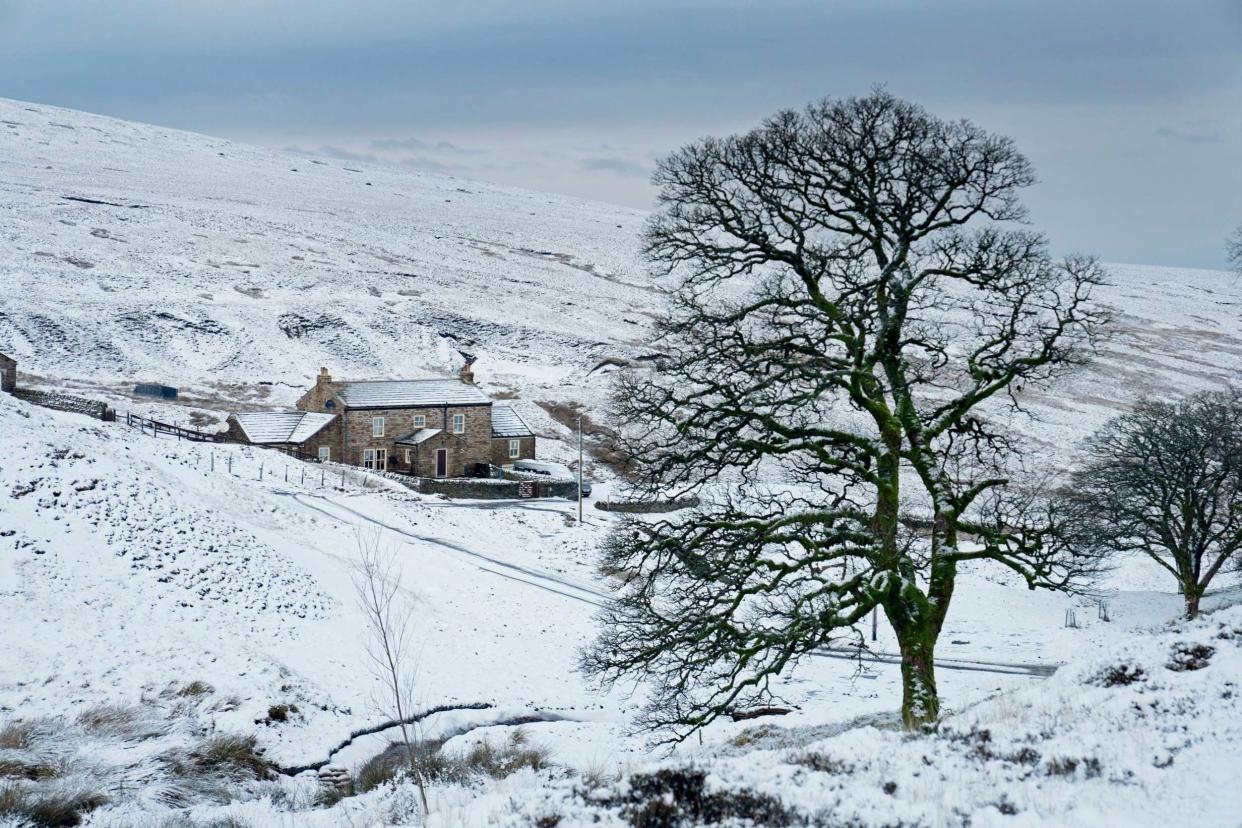 Snow lies on the ground near Carrshield, southwest of Hexham, in Northumberland: PA