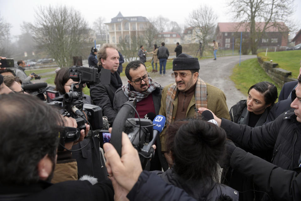 Yemen's Minister of Agriculture and Irrigation Othman Hussein Faid Mujali, right, speaks to journalists during the ongoing peace talks on Yemen held at Johannesberg Castle, in Rimbo, Sweden, Friday, Dec. 7, 2018. The United Nations’ refugee agency said Friday that there have been nearly 1,500 civilian casualties in Yemen from August through October, the latest grim tally to emerge from a 4-year civil war as opposing parties meet for talks in Sweden. (Janerik Henriksson/TT via AP)