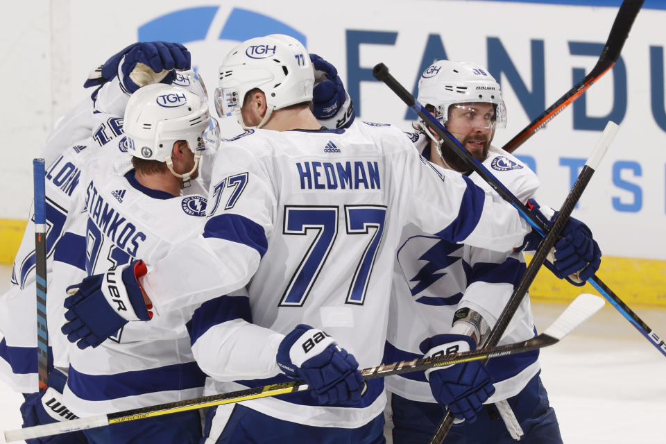Tampa Bay Lightning right wing Nikita Kucherov (86) celebrates his first of two goal during the second period against the Florida Panthers in Game 1 of an NHL hockey Stanley Cup first-round playoff series, Sunday, May 16, 2021, in Sunrise, Fla. (AP Photo/Joel Auerbach)