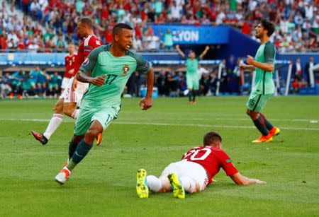 Football Soccer - Hungary v Portugal - EURO 2016 - Group F - Stade de Lyon, Lyon, France - 22/6/16 Portugal's Nani celebrates scoring their first goal REUTERS/Jason Cairnduff Livepic