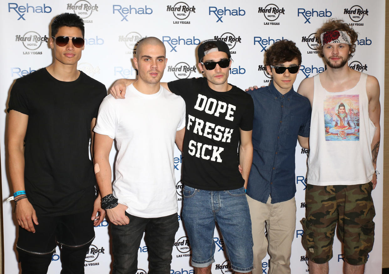 LAS VEGAS, NV - APRIL 27:  (L-R) Singers Siva Kaneswaran, Max George, Tom Parker, Nathan Sykes and Jay McGuiness of The Wanted arrive at the Hard Rock Hotel & Casino during the resort's Rehab pool party on April 27, 2014 in Las Vegas, Nevada.  (Photo by Gabe Ginsberg/FilmMagic)