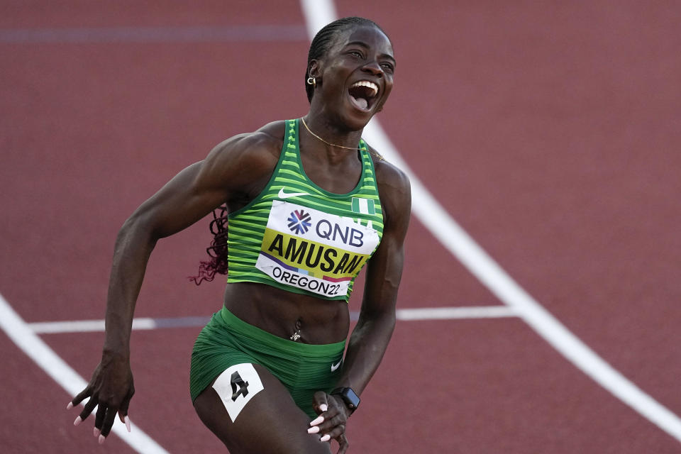 Tobi Amusan, of Nigeria, celebrates winning the women's 100-meter hurdles final at the World Athletics Championships on Sunday, July 24, 2022, in Eugene, Ore. (AP Photo/Gregory Bull)