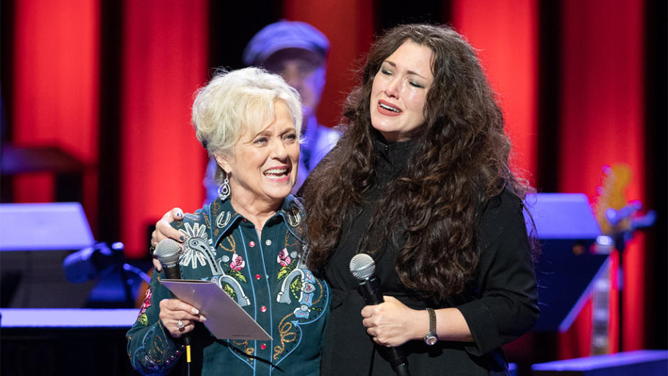 Mandy Barnett being told by Connie Smith she will be inducted into Grand Ole Opry - Credit: Courtesy of Chris Hollo / Hollo Photographic