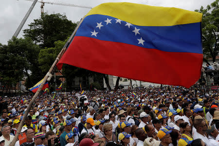 Supporters of Venezuelan opposition leader Juan Guaido, who many nations have recognised as the country's rightful interim ruler, take part in a rally in support of the Venezuelan National Assembly and against the government of Venezuela's President Nicolas Maduro in Caracas, Venezuela, May 11, 2019. REUTERS/Ueslei Marcelino