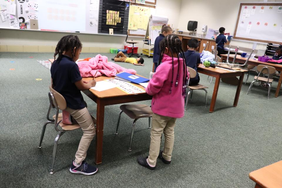 Kindergarten students at Harrison Elementary work on drawings during class on Wednesday, May 3, 2023.