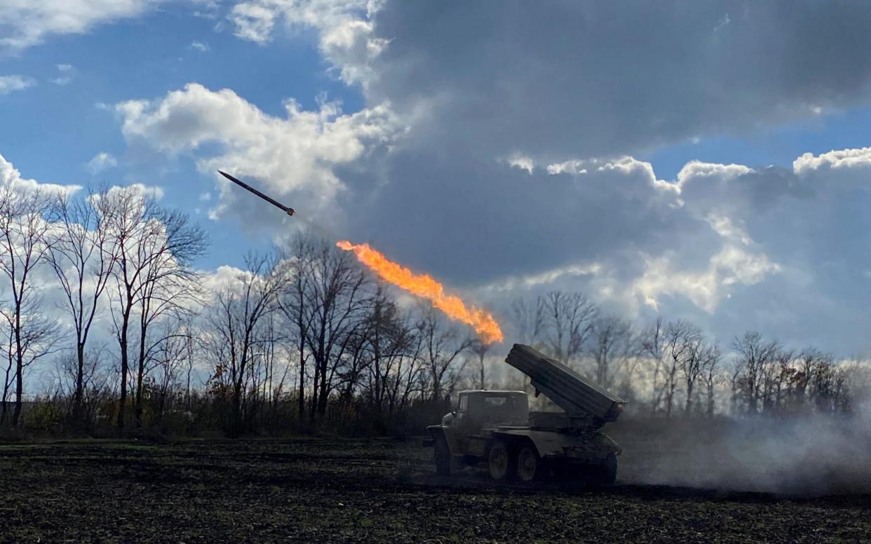 Ukrainian troops fire a rocket towards a Russian position on the border of the Kharkiv and Luhansk regions - Reuters