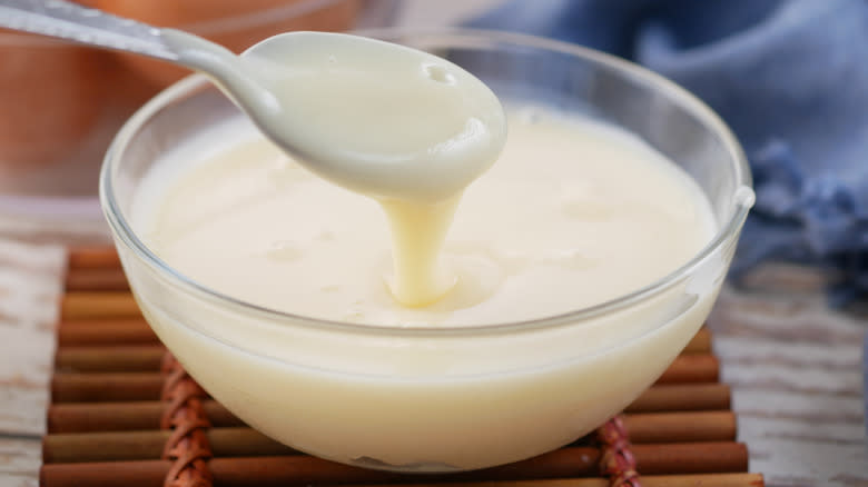 Concensed milk in bowl with spoon