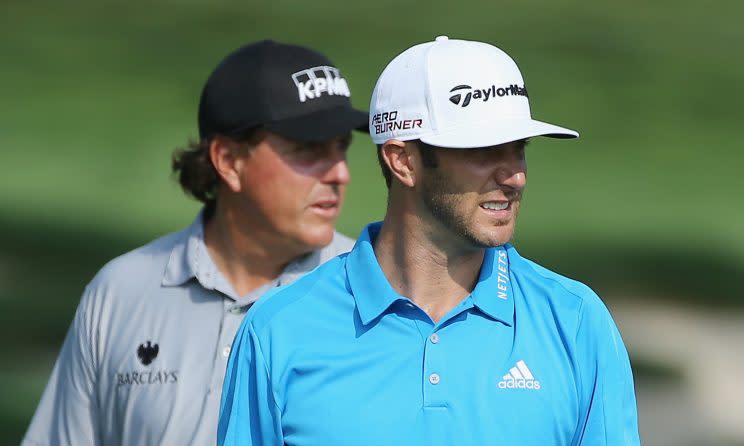 EDISON, NJ - AUGUST 25: Phil Mickelson and Dustin Johnson of the United States wait in a fairway during a practice round prior to the start of The Barclays at Plainfield Country Club on August 25, 2015 in Edison, New Jersey. (Photo by Scott Halleran/Getty Images)