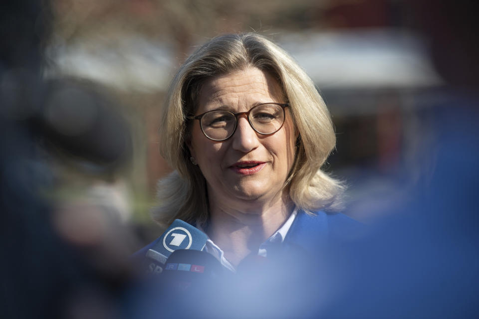 German politician Anke Rehlinger, SPD's top candidate, speaks to the media at a polling station in Nunkirchen, Saarland, Germany, Sunday, March 27, 2022. The western German state of Saarland is holding a state election that offers the country’s first test at the ballot box since Chancellor Olaf Scholz’s national government took office in December. Polls point to a solid lead for Scholz’s center-left Social Democrats in a region led since 1999 by the center-right Christian Democratic Union of former Chancellor Angela Merkel. (Boris Roessler/dpa via AP)