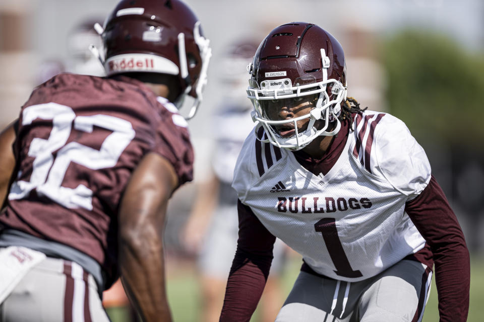 FILE - In this Aug. 18, 2020, file photo provided by Mississippi State Athletics, Mississippi State cornerback Martin Emerson (1) sets up for a passing drill during the practice for the NCAA college football team in Starkville, Miss. What remains of a college football season already altered by the pandemic is about to ramp up this weekend. Outbreaks can leave teams unable to play, not just because they sideline the infected but also because anyone deemed a close or high-risk contact is required to quarantine for 14 days. (Austin Perryman/Mississippi State Athletics via AP, File)