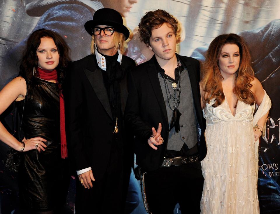 Michael Lockwood, Ben Keough and Lisa Marie Presley attend the World Premiere of Harry Potter And The Deathly Hallows: Part 1 at Odeon Leicester Square on November 11, 2010 in London, England