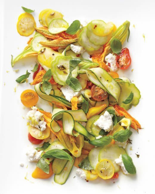 <strong>Get the <a href="http://www.marthastewart.com/901401/shaved-squash-salad-tomatoes-zucchini-blossoms-ricotta-and-thyme-oil?czone=holiday/sixty-days-of-summer/recipes-ideas%3Fxsc%3Dsoc_pin_Shaved-SquashSaladwithTomatoesZucchiniRicotta&crlt.pid=camp.fkUSl6cB4rLx" target="_blank">Shaved-Squash Salad With Tomatoes, Zucchini Blossoms, Ricotta, And Thyme Oil</a> recipe from Martha Stewart</strong>