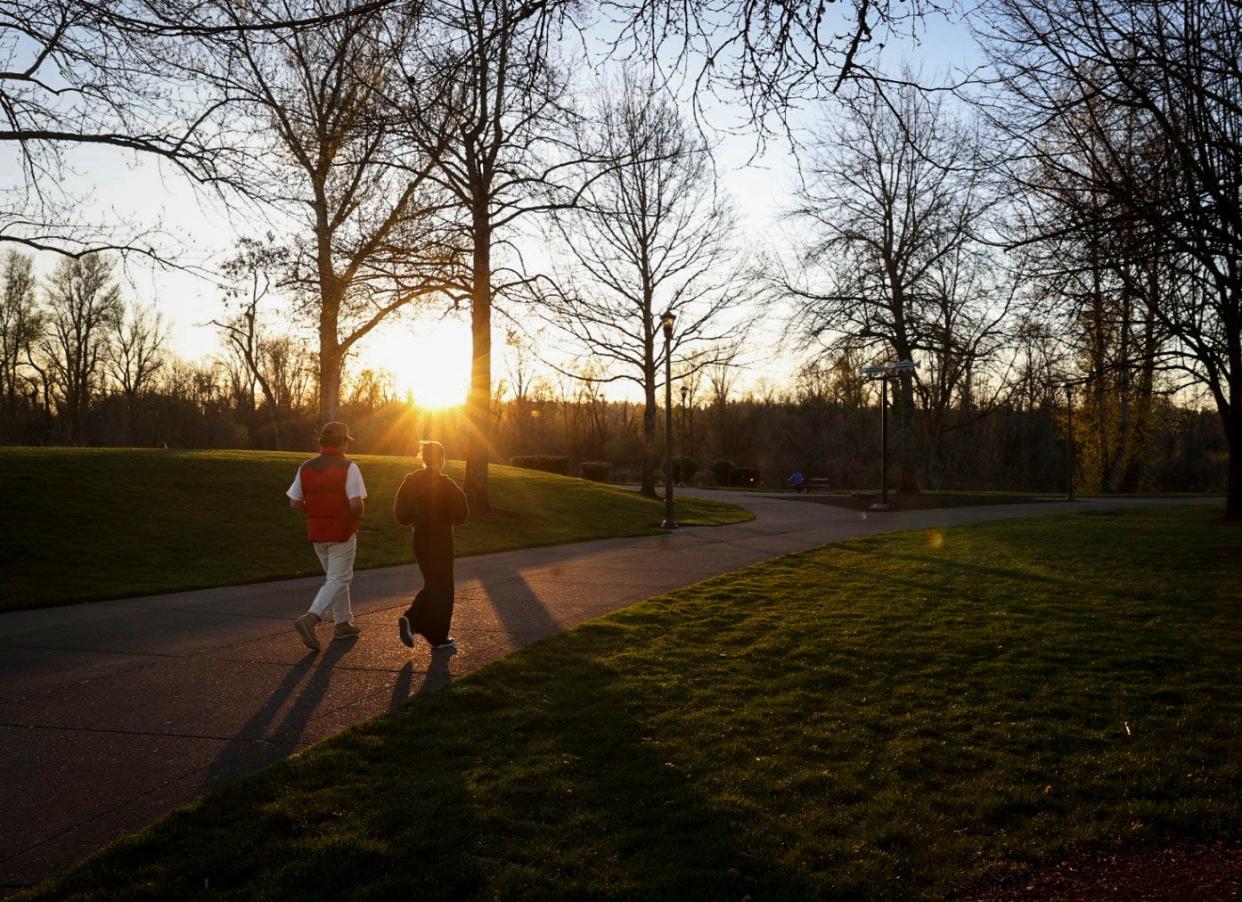 People enjoy the weather on the first day of spring at Riverfront Park on Tuesday, March 19, 2024 in Salem, Ore.