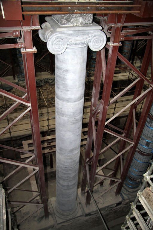 A new pillar is installed inside St Mel's Cathedral in the town of Longford in Ireland that was gutted in a fire on Christmas day in 2009. The project, costing an estimated 30 million euros ($39.5 million), will create nearly 150 jobs, a badly needed boost in a country with an unemployment rate of 14.6 percent