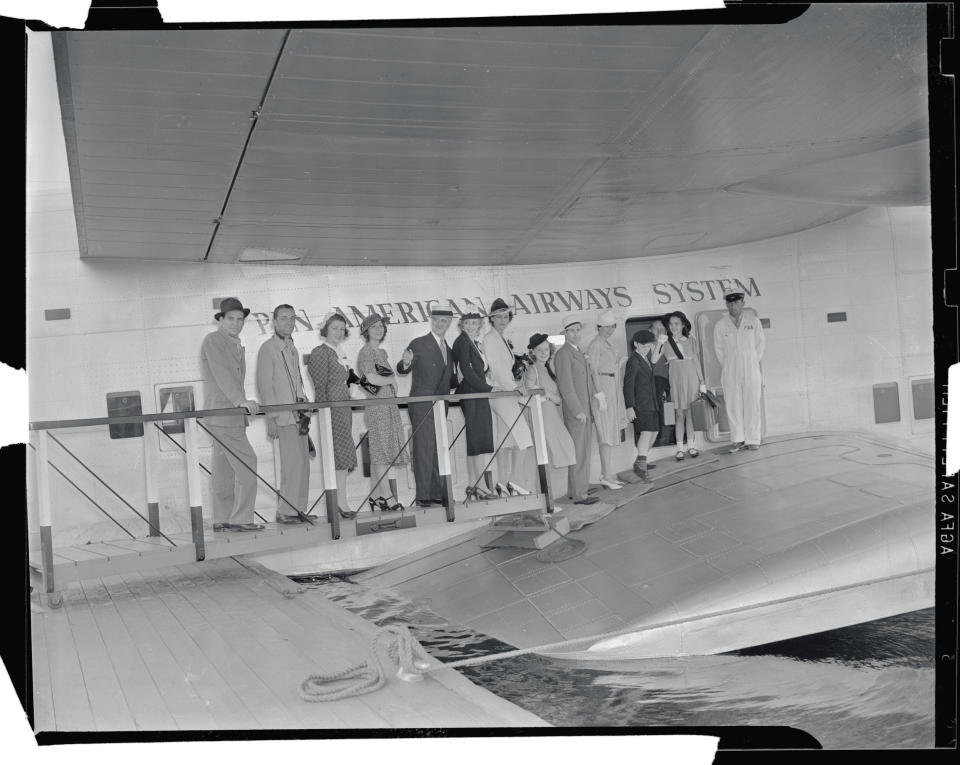 Passengers boarding Pan American clipper ship at Port Washington, NY circa 1939.