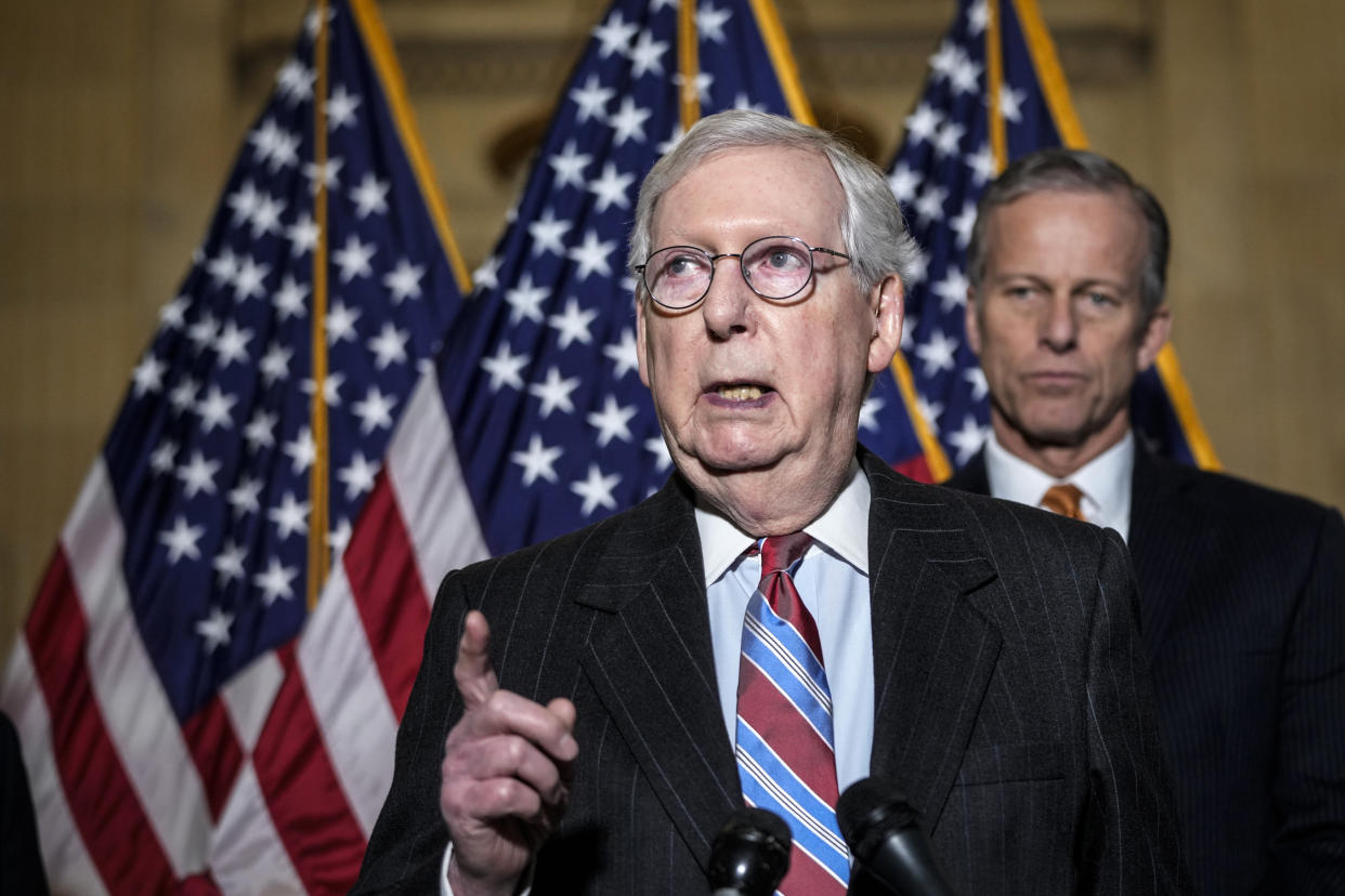 Image: Senate Minority Leader Mitch McConnell speaks to reporters following a lunch meeting with Senate Republicans on Capitol Hill on Feb. 8, 2022. (Drew Angerer / Getty Images)