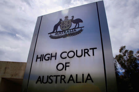 FILE PHOTO: A sign stands outside the High Court of Australia in Canberra, Australia, October 15, 2014. REUTERS/David Gray/File photo