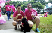 Many participants also took the opportunity to bring their pets to the park. Thomas and Grahame, from the Singapore Men's Chorus were spotted at Pink Dot with their adorable dog, cookie. (Yahoo! photo/Melissa Law)