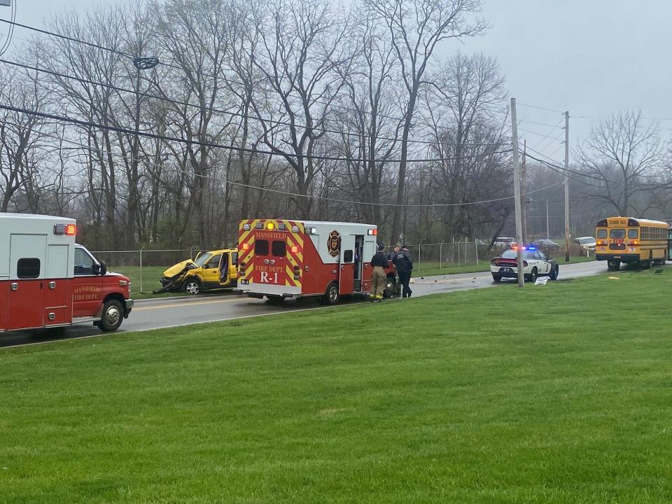 Mansfield police and firefighters are investigating a Madison school bus-vehicle crash on Oak Street Wednesday. No students on the bus were seriously injured. One person was transferred by squad to a hospital from the compact vehicle, a fire official said.