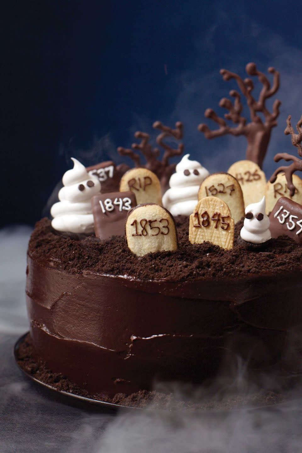 <p>Bury those chocolate cravings for good with this rich layer cake that's spook-tacular for Halloween and a sensational choice year-round with an espresso-tinged batter and bittersweet chocolate frosting. Just don't include the mini graveyard during the other months of the year.</p><p><a href="https://www.womansday.com/food-recipes/food-drinks/recipes/a11822/graveyard-cake-recipe-123437/" rel="nofollow noopener" target="_blank" data-ylk="slk:Get the recipe for Graveyard Cake.;elm:context_link;itc:0;sec:content-canvas" class="link "><em>Get the recipe for Graveyard Cake.</em></a></p>