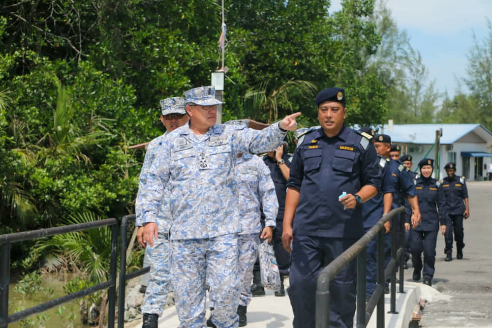 NTF commander Vice-Admiral Datuk Aris Adi Tan Abdullah during a visit to front operation base in Kuala Linggi. — Picture courtesy of National Task Force