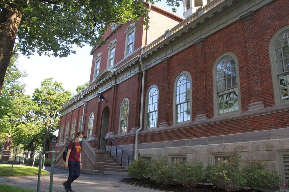 CAMBRIDGE , July 14, 2020-- A student walks on the campus of Harvard University in Cambridge of Massachusetts, the United States, on July 14, 2020. The U.S. government has rescinded a new rule that could have denied international students their stay in the country if they only attend online courses in the coming fall semester, a federal judge in Boston, Massachusetts said Tuesday. (Photo by Fan Lin/Xinhua via Getty) (Xinhua/ via Getty Images)