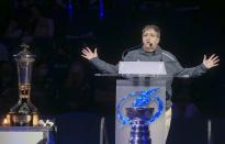 Tampa Bay Lightning owner Jeff Vinik speaks as the Stanley Cup, bottom, and Prince of Wales Trophy, left, are seen at Amalie Arena Tuesday, Sept. 29, 2020 in Tampa, Fla. (Dirk Shadd/Tampa Bay Times via AP)