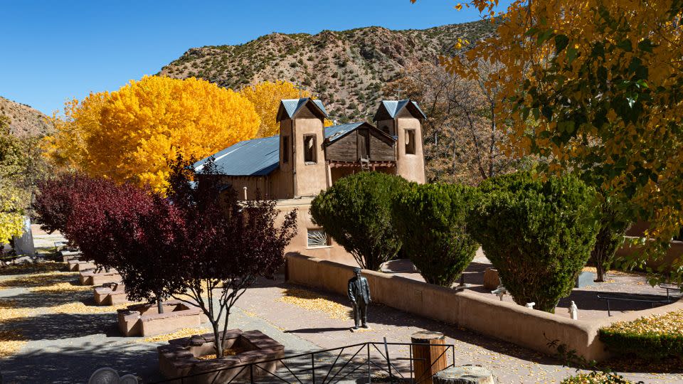 Santuario de Chimayó in New Mexico is a lovely and historic stop along the High Road to Taos Scenic Byway. - New Mexico True