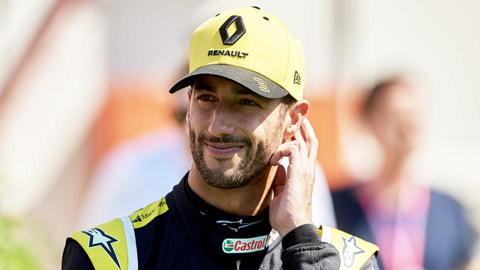 Renault's Daniel Ricciardo scratching his head.