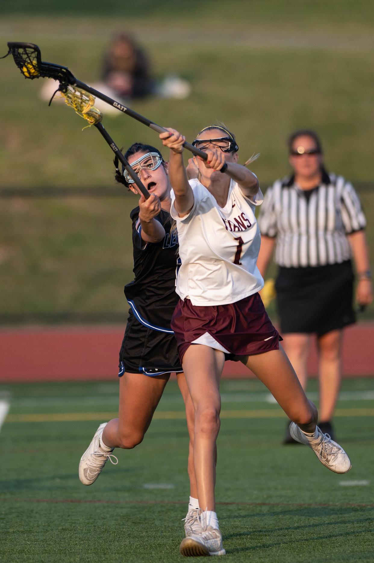 Algonquin's Grace Chiota and Leominster's Nina Marchetti battle for possesion.