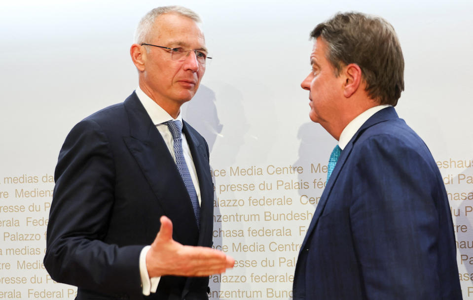 Chairman of the Board of Directors of UBS, Colm Kelleher and Chairman of the Board of Directors of Credit Suisse, Axel Lehmann attend a news conference on Credit Suisse after UBS takeover offer, in Bern, Switzerland, March 19, 2023. REUTERS/Denis Balibouse