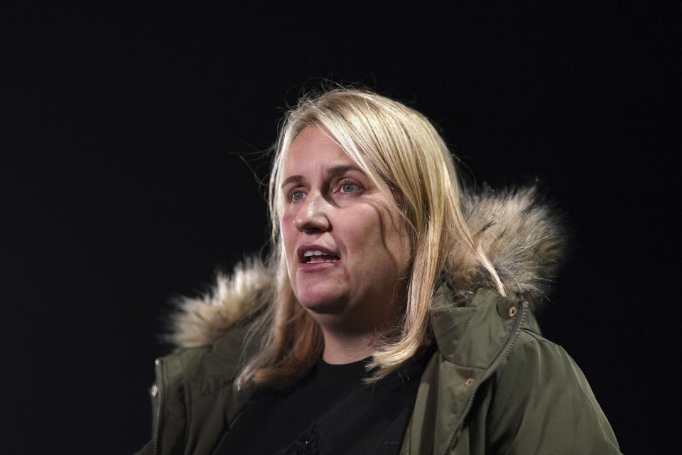 Chelsea manager Emma Hayes walks on the pitch prior to the women's Champions League group C soccer match between Chelsea and Servette, at Kingsmeadow, London, Thursday, Nov. 18, 2021. (Adam Davy/PA via AP)