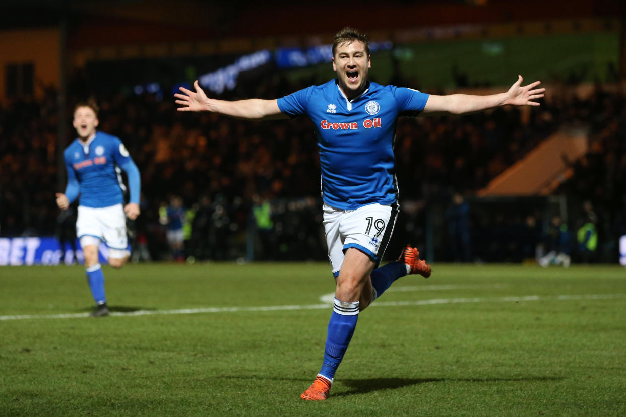 Rochdale’s Steven Davies celebrates his late equalizer against Tottenham in the FA Cup. (Getty)