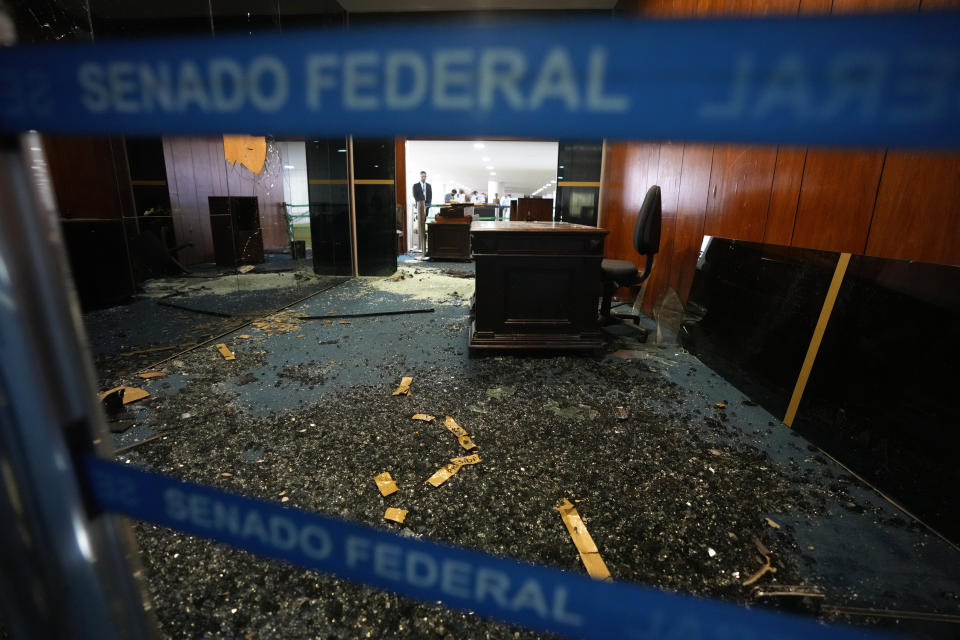FILE - A view of the the Senate president's office entrance, the day after supporters of former Brazilian President Jair Bolsonaro stormed the building, in Brasilia, Brazil, Jan. 9, 2023. Members of the three branches of power in Brazil say the country’s democracy and its guardrails have been restored after the trashing of government buildings. But arrests have led supporters of the former president to say their freedom of speech is being violated and claim they are politically persecuted. (AP Photo/Eraldo Peres, File)