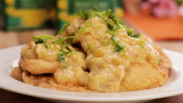 crispy fried fish drizzle with creamy corn paste